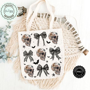 May include: A cream-colored tote bag featuring a repeating pattern of floral-decorated skulls, black bows, bats, and stars. The bag has long, natural-colored handles. The words "ORIGINAL DESIGNER" are in a circular logo on the upper left.
