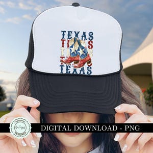 May include: A white and black trucker hat with a design of red, white, and blue cowboy boots and the text "Texas,  Tis,  Texas".
