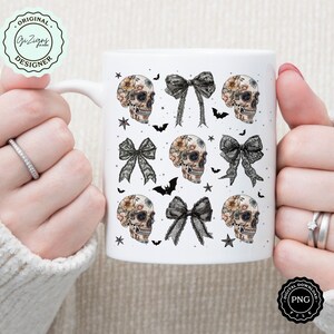 May include: White ceramic mug featuring a repeating pattern of floral skull illustrations and black lace bows. The design includes bats and stars. The mug has the text "ORIGINAL DESIGNER" and "DIGITAL DOWNLOAD PNG FILE".