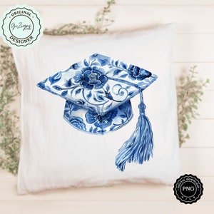 May include: Blue and white graduation cap with a floral pattern. The cap has a tassel and is painted in a watercolor style.