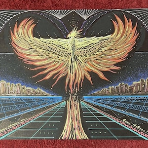 May include: A black and white drawing of a phoenix rising from a city skyline. The phoenix is depicted in gold and red, with its wings spread wide. The city skyline is in the background, with a grid pattern in the foreground. The drawing is signed "Brian Hartman 6.10.23".
