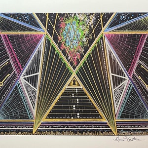 May include: A black and white geometric abstract art print with gold, pink, and blue accents. The print features a central pyramid shape with a keyhole at the top. The artist's signature is in the bottom right corner.