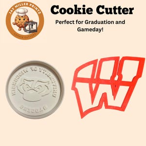 May include: Red plastic cookie cutter shaped like the letter "W" with a stylized design. The cutter is shown next to a white plastic mold with a badger design and the text "University of Wisconsin".