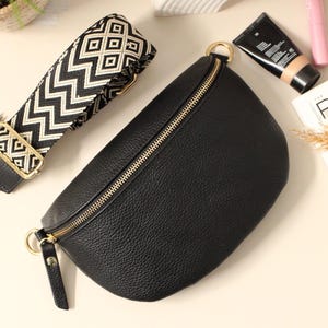 Black Leather Crossbody Bag with Patterned Strap