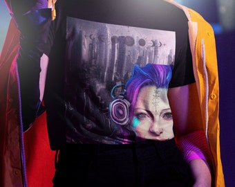 May include: Black t-shirt featuring a graphic print of a woman with purple hair and a futuristic cityscape in the background.