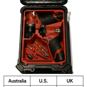 May include: A black and red tool case containing two red and black cordless drills and a set of drill bits. The case has a label that says "Handyman Depot" and a table with model numbers for Australia, U.S., and UK.