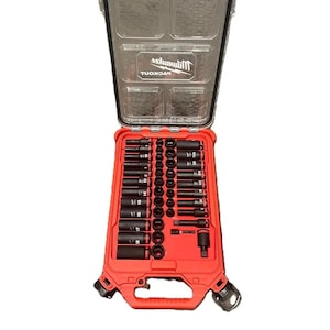May include: A red and black socket organiser with a clear plastic lid. The organiser is full of various sizes of sockets. The text "PACKOUT" and "Milwaukee" are visible on the lid. The text "Tools & Packout Not Included - Insert Only" is visible below the image.