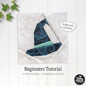 Pode incluir: Um padrão de bloco de colcha de chapéu de bruxa de uma única unidade de 5 polegadas com instruções fotográficas. O padrão apresenta um chapéu de bruxa azul e verde sobre um fundo branco.