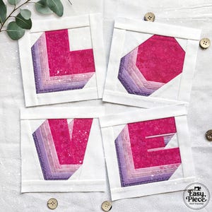 May include: Four square fabric quilt blocks arranged to spell the word LOVE. Each letter is constructed from layered fabric strips in shades of pink and purple with floral patterns, framed by solid white borders. The text Easy Piece Patterns is visible.