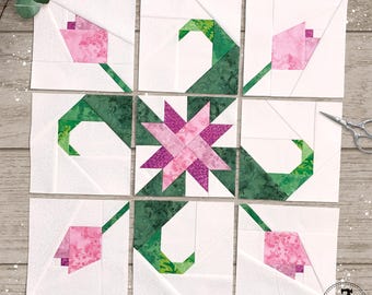 4 Designs in 4 sizes, including Woven star, Magnolia Bud and Ocean Waves. 8 layout guides included. FPP foundation paper piecing patterns.