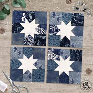 May include: Four square quilt blocks with a white star design, surrounded by various blue patterned fabrics. The blocks are arranged on a wooden surface, with sewing tools and notions scattered around.