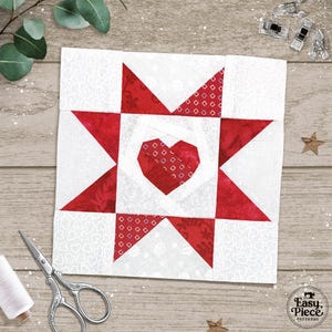 May include: A white and red quilt block with a heart and star design. The heart is in the center, surrounded by red star points. The background is white with a subtle heart pattern. The block is part of the Easy Piece Patterns collection.