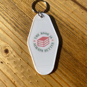 Bookish Motel Keychain: &quot;The Book Is Always Better&quot;