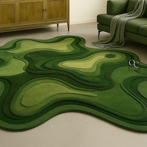 May include: A unique, abstract rug in shades of green, resembling a topographical map. The rug features layered textures and varying shades of green, creating a three-dimensional effect. The rug's irregular shape adds to its modern appeal, making it a statement piece for any living space.