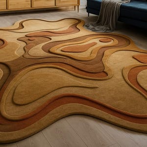 May include: A large, abstract area rug with a layered design in shades of brown and tan. The rug has a unique, organic shape, resembling a topographical map. The varying tones create a sense of depth and texture, adding a modern touch to the room.