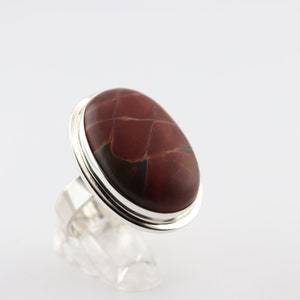 Handcrafted silver ring with a Picasso Jasper setting.