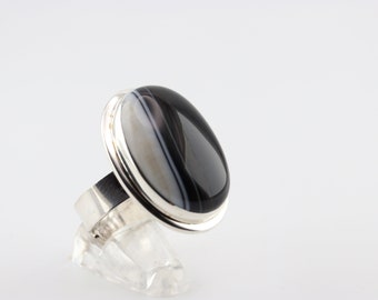 Handcrafted silver ring with a Botswana Agate setting.