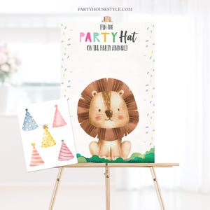 May include: A printable game for a party. The game is called "Pin the Party Hat on the Party Animal!" and features a lion with a brown mane and a white face. There are six colorful party hats to pin on the lion.