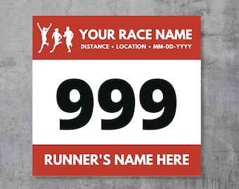 May include: White and red running race bib with the number 999 printed in black. The text "YOUR RACE NAME" is printed in black on the top red band. The text "DISTANCE  LOCATION  MM-DD-YYYY" is printed in black below the race name. The text "RUNNER'S NAME HERE" is printed in black on the bottom red band.