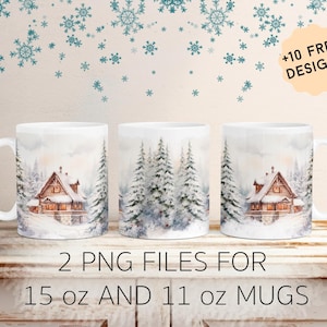 May include: Two white ceramic mugs with a winter scene design. The design features a snowy cabin with trees in the background. The mugs are 15 oz and 11 oz.