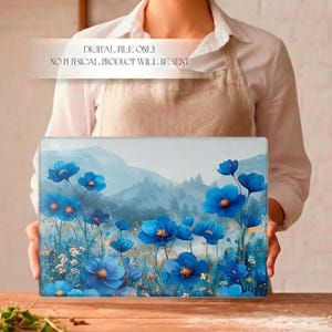 May include: A rectangular art print featuring a field of blue flowers with yellow centers, set against a backdrop of blue mountains and a light blue sky. The print has the text: DIGITAL FILE ONLY, NO PHYSICAL PRODUCT WILL BE SENT.