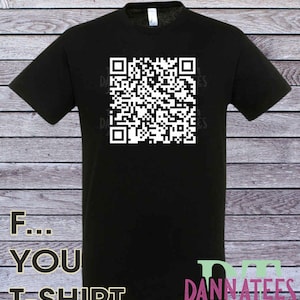May include: Black t-shirt with a white QR code printed on the front. The text "F... YOU T-SHIRT" is printed below the QR code. The text "DANNATEES" is printed in the bottom right corner of the shirt.
