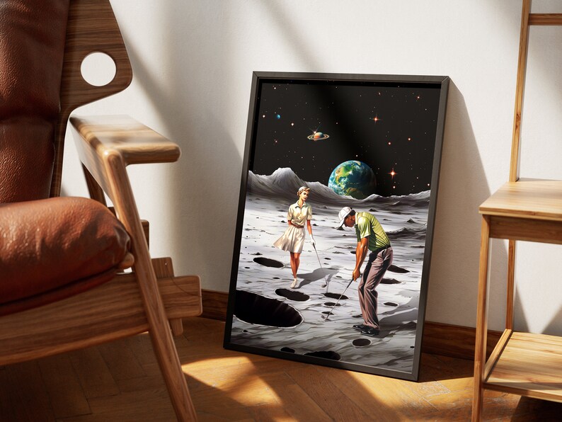 May include: A framed print of a surrealist artwork depicting a man and woman playing golf on the moon. The moon's surface is cratered, and Earth is visible in the background. The artwork is set against a black background with stars.