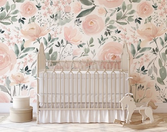 May include: A nursery room with a white crib and a pink floral wallpaper. The wallpaper features a watercolor design of pink roses and green leaves.