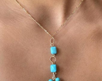 Square turquoise stones on a gold-plated steel chain