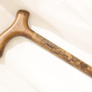 Engraved wooden walking stick