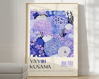 May include: A framed art print with an abstract floral design in blues, purples, and white. The print includes the artist's name, Yayoi Kusama, and Japanese text. The artwork is displayed in a room with a neutral colour palette.