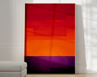 May include: Abstract art print with a layered design of red, orange, and purple colors. The print is framed in a thin, gold frame.
