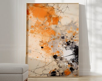 Può includere: Stampa d'arte astratta con schizzi di vernice arancio, nero e bianco e un motivo a rete. La stampa è incorniciata in una cornice sottile e dorata ed è appesa a una parete bianca.
