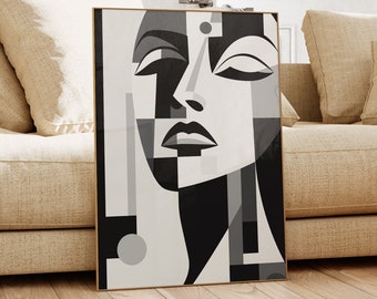 May include: A black and white geometric abstract art print of a woman's face. The print is framed in a gold frame and is hanging on a white wall.