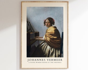 Può includere: Una stampa incorniciata di un dipinto di Johannes Vermeer intitolato "Una giovane donna seduta al virginale". Il dipinto raffigura una donna con uno scialle giallo che suona uno strumento a tastiera.