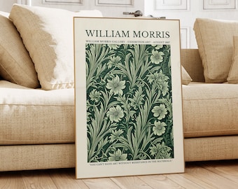 May include: A framed poster with a green and white floral pattern. The poster has the text "William Morris" at the top and "William Morris Gallery - Exhibition Art - August 1987" below it. The text "You can't have art without resistance in the materials" is at the bottom of the poster.
