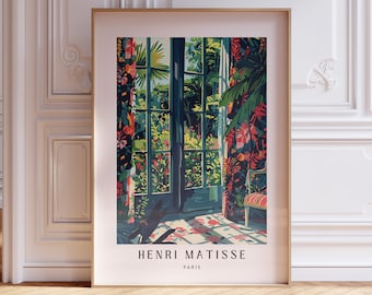 Könnte beinhalten: Ein gerahmter Druck eines Gemäldes von Henri Matisse, das einen Blick auf einen Garten durch eine Tür zeigt. Das Gemälde zeigt leuchtende Farben, darunter Grün, Blau, Rot und Gelb. Der Rahmen ist in schlichtem Gold gehalten.