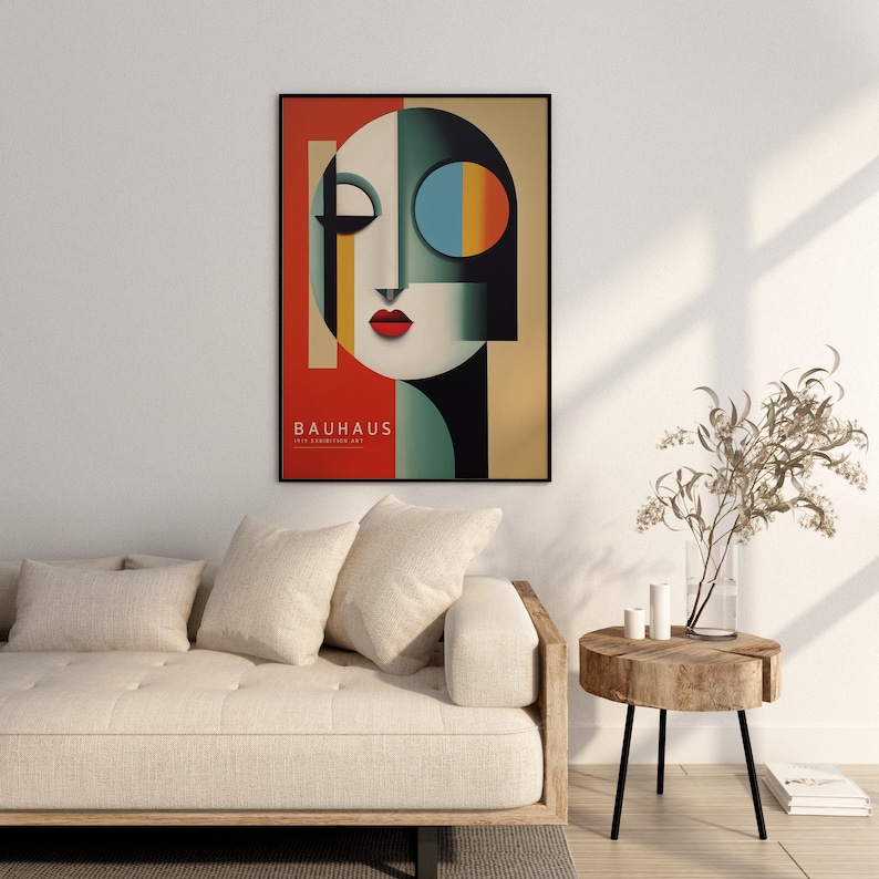 Puede incluir: Un p&oacute;ster enmarcado con un dise&ntilde;o geom&eacute;trico en tonos de rojo, negro, blanco, azul y amarillo. El p&oacute;ster presenta una cara estilizada con un solo ojo y el texto "BAUHAUS 1919 EXHIBITION ART".