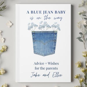 Könnte beinhalten: Ein weißes Buchcover mit einer Grafik einer blauen Jeanstasche, die mit hellblauen Blumen gefüllt ist. Der Text lautet: A BLUE JEAN BABY is on the way, Advice + Wishes for the parents, Jake and Ellie. Das Design verwendet dunkelblaue Schriftarten.