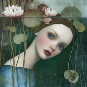 May include: A digital art print featuring a woman with blue eyes and red lips, submerged in water. White water lilies and lily pads float on the surface. A small green frog rests on a lily pad. The artwork has a dreamy, ethereal quality.