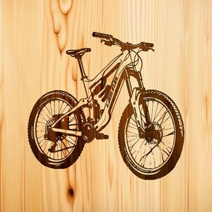May include: A black and white illustration of a mountain bike with a wooden background. The bike has a suspension fork and a rear shock.