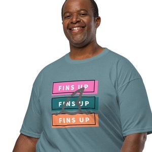 Fins Up, Jimmy Buffett, Jimmy Buffett merch, Jimmy Buffett t-shirt, Men’s premium heavyweight tee