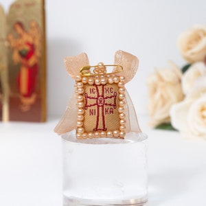 Greek Orthodox Protection Amulet, Filakto with ICXC NIKA in natural brown  Color and ribbon -From Monastery in Tinos Island ,In a gift box .