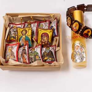 Perfect Christian Gift Set with 10 amulets With saints  - Anointing Oil - Wooden bracelet with Holy Icons an Amulet in a box.