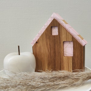 Napkin holder as a house handmade from solid oak