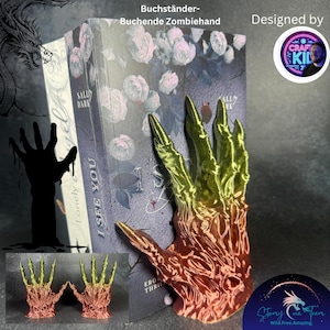 May include: A pair of colorful, 3D printed zombie hands bookends. The hands are green, yellow, and orange. The bookends are holding a book with the title "I See You" and the author "Sally Dark".