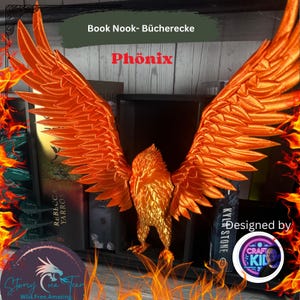 May include: A 3D printed orange phoenix bookend with outstretched wings. The bookend is sitting on a bookshelf with books behind it. The text "Book Nook- Bücherecke" and "Phönix" is visible above the bookend. The text "Designed by" and a logo for "Craft Kid" is visible below the bookend.