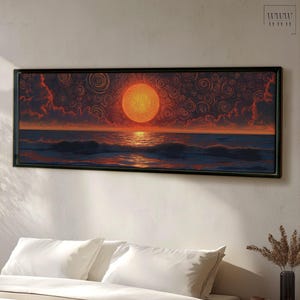 May include: A framed canvas print of a sunset over the ocean. The sun is a bright orange and red, and the sky is a deep blue with swirling patterns. The ocean is a dark blue with white waves.