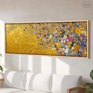 Könnte beinhalten: Ein gerahmtes abstraktes Gemälde mit goldenem Hintergrund und einer Vielzahl von bunten Kreisen und Punkten. Das Gemälde ist in einem Holzrahmen.