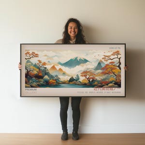 May include: A vintage poster featuring a Japanese landscape scene with a mountain, trees, and a river. The poster is in a black frame and has the text "JAPANOI ART 1966", "PREMIUM GALLERY", "近代美術唱力", and "VILLE DE PARIS MUS&Eacute;E D'ART MODERNE" printed on it.
